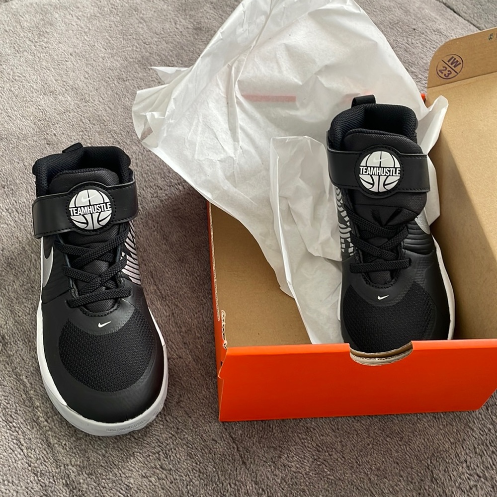 Nike boys TeamHustle Basketball shoes.  Size 2.  New, never worn